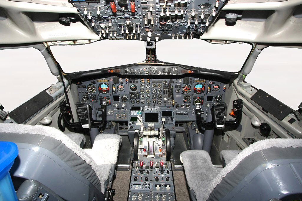 Original 737-200 cockpit similar to the TAME Boeing 737-200 crashed in 1983. World Insurance Companies Logos.