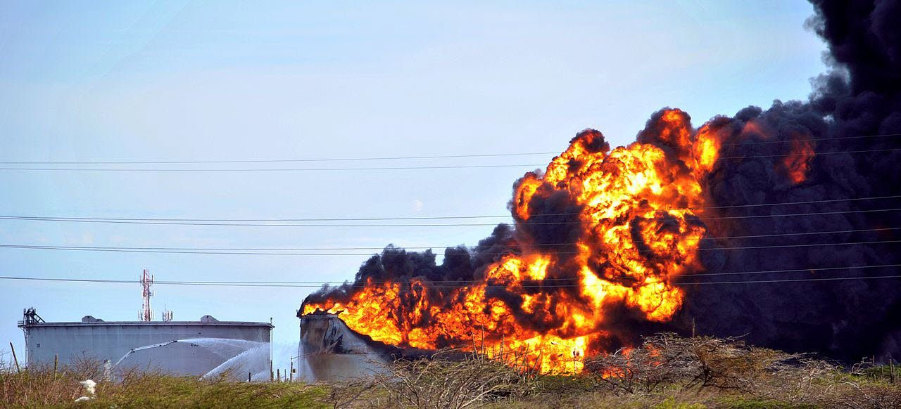 The image shows a Photo of the fire that originated from an explosion due to a gas leak at the Paraguaná Refinery Complex