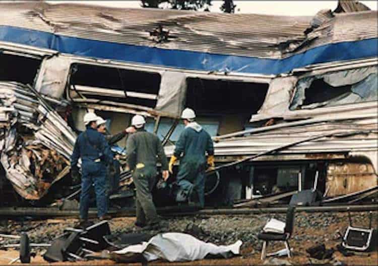 The image shows the staff checking the train in search of more victims
